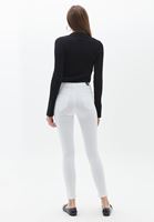 V Yaka Triko Atlet ve Skinny Jean Kombini