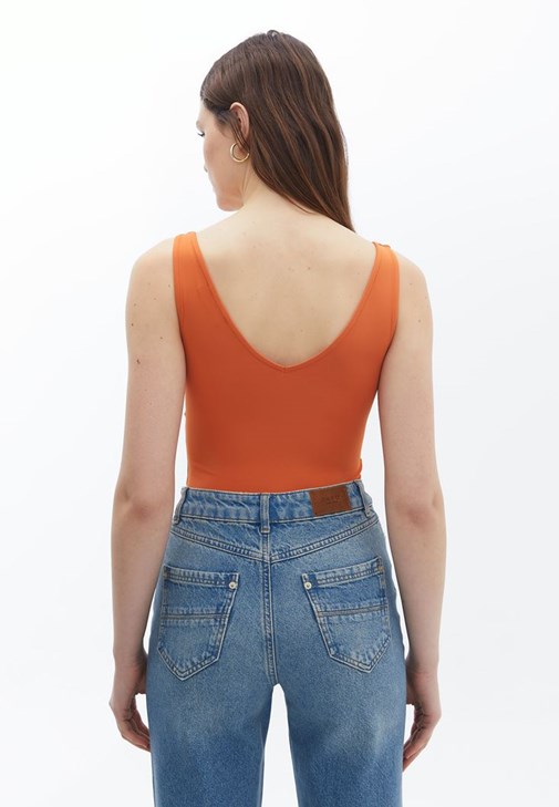 V Yaka Bodysuit ve Denim Pantolon Kombini