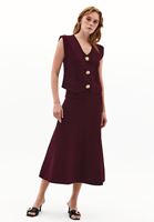 Orta Bel Etek ve Triko Yelek Kombini