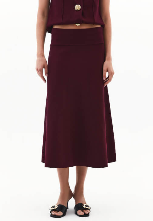 Orta Bel Etek ve Triko Yelek Kombini