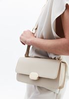 Women Cream Shoulder bag with buckle and strap details