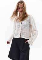 Women Cream Embroidered V-Neck Blouse