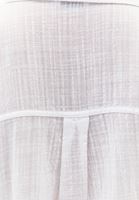 Cepli Gömlek ve Carrot-Fit Pantolon Kombini