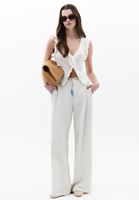 Wide-Leg Pantolon ve Sırt Dekolteli Bluz Kombini