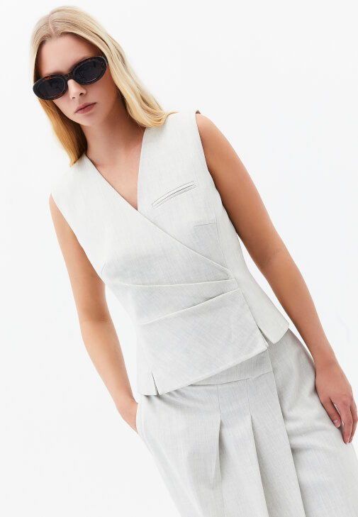 Pileli Yelek ve Uzun Etek Kombini