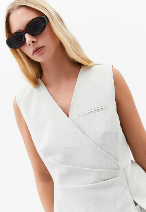 Pileli Yelek ve Uzun Etek Kombini